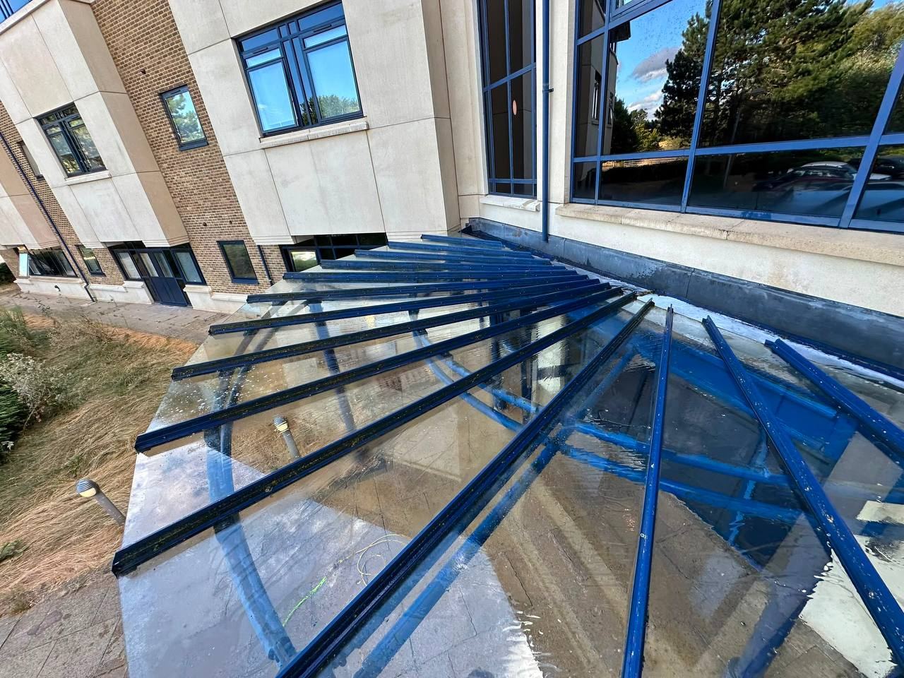 Clean glass conservatory roof after Pure Water Ready cleaned it, clear enough to reflect the sky