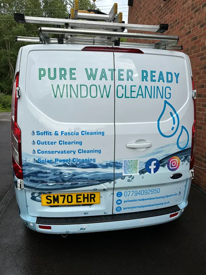 Rear of the Pure Water Ready van showing services and contact details